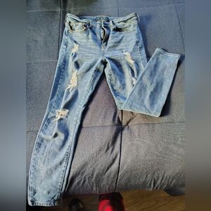 Distressed Blue Denim Jeans